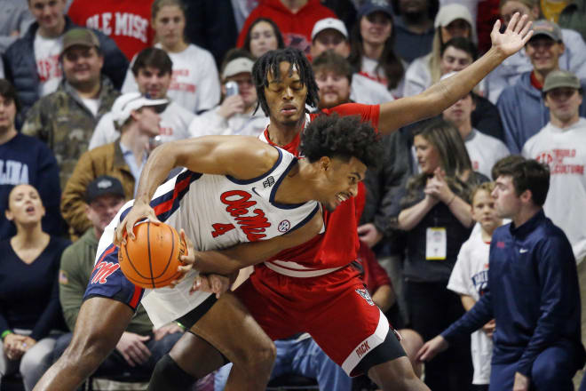 Ole Miss Rebels forward Jaemyn Brakefield (4) drives to the basket as North Carolina State Wolfpack guard Dennis Parker, Jr. (11) defends during the first half at The Sandy and John Black Pavilion ... Petre Thomas-USA TODAY Sports