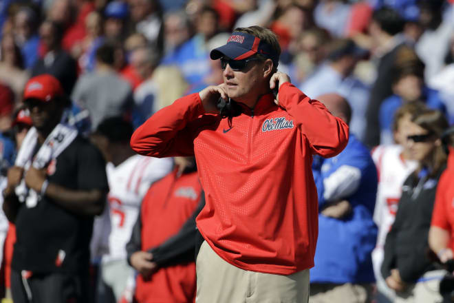 Ole Miss coach Hugh Freeze looks on during the Rebels' loss to Memphis in October. The Rebels' football program was named in a letter of allegations submitted to the school by the NCAA, Yahoo reported Friday.