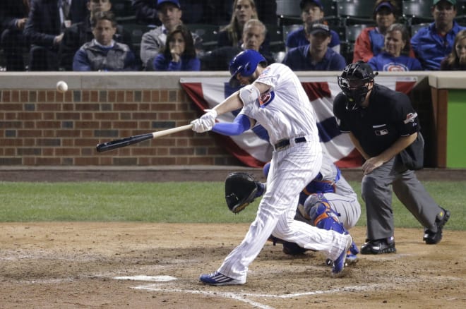 Chicago Cubs third baseman Kris Bryant homers in the eighth inning of Game 4 of the National League Championship Series, a series won by the New York Mets, 4-0.