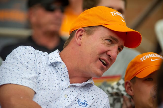 NFL great Peyton Manning takes in an 8-6 Irish win over his alma mater, top-ranked Tennessee, on Friday night.