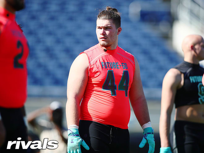 Rivals100 offensive lineman Rocco Spindler holds a Michigan Wolverines football recruiting offer from Jim Harbaugh.