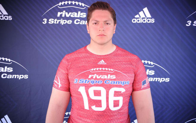 Michigan offensive lineman Alex Howie visited the Iowa Hawkeyes this past weekend.
