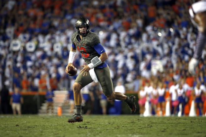 Oct 14, 2017; Gainesville, FL, USA; Florida Gators quarterback Feleipe Franks (13) runs out of the pocket against the Texas A&M Aggies during the first half at Ben Hill Griffin Stadium.