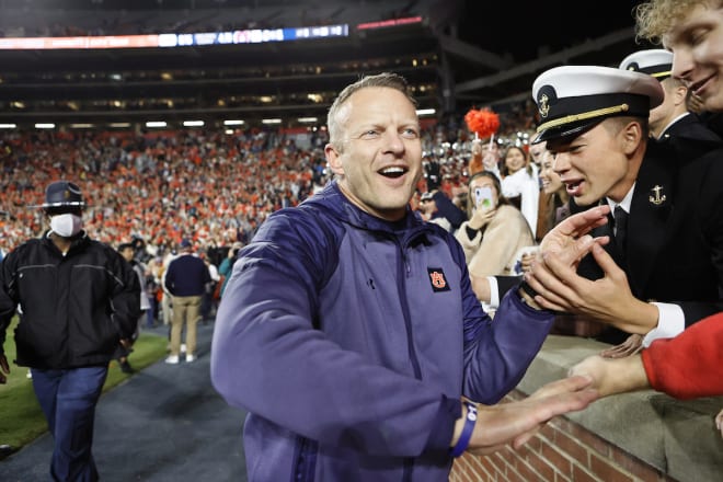 Bryan Harsin greets fans after the win against Ole Miss.