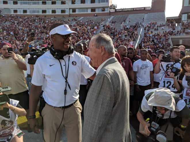 Willie Taggart and Bobby Bowden share a moment prior to the 2018 spring football game.