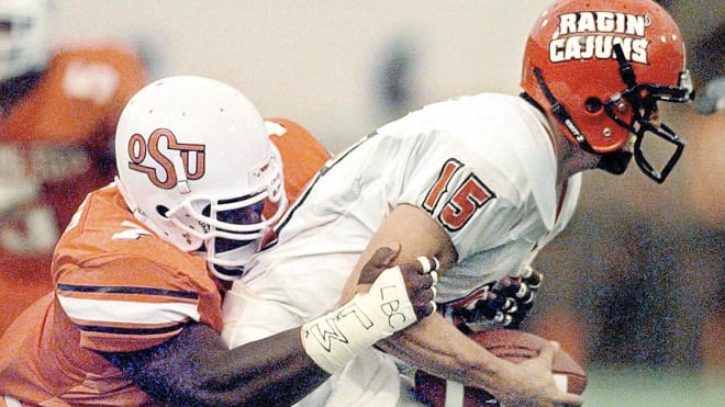 Kenyatta Wright (#7) during his playing days at Oklahoma State