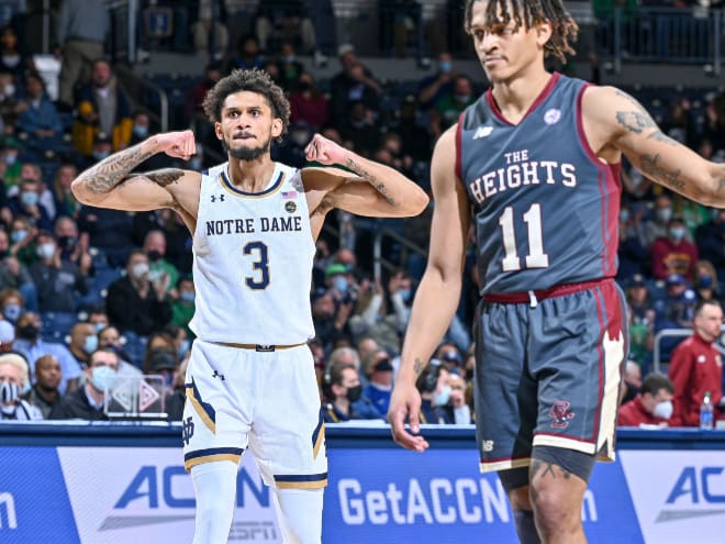Notre Dame guard Prentiss Hubb, left, scored the last six Irish points in overtime to secure a 99-95 win over Boston College.