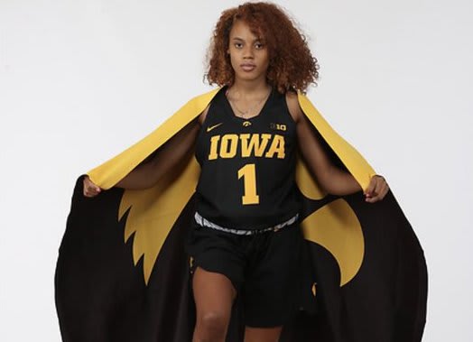  Kennise Johnson Etienne committed to Iowa. 