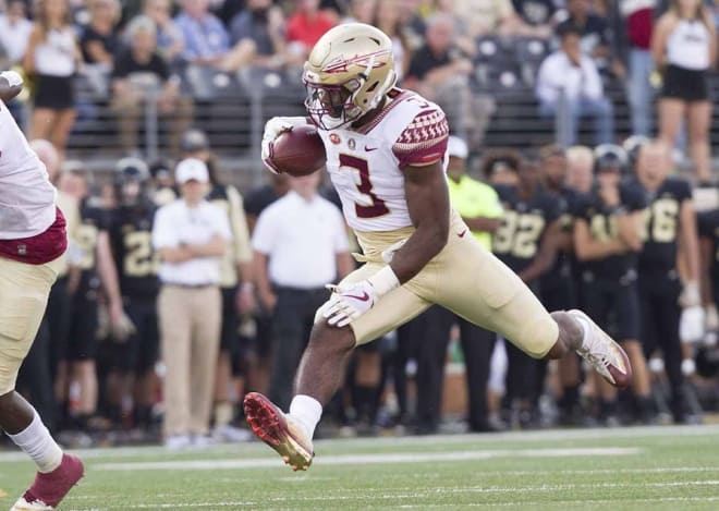 Freshman tailback Cam Akers gets some air time during a carry last Saturday at Wake Forest.