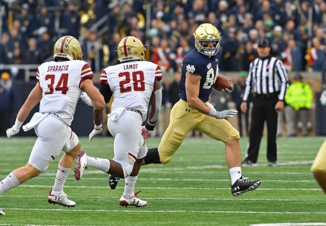 Cole Kmet grabbed seven passes for 78 yards against Boston College, highlighted by his sixth touchdown this season, tying a school record for tight ends.