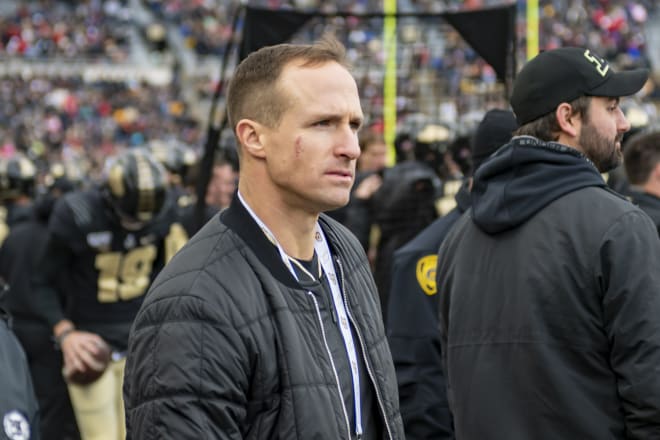 Purdue Boilermaker legend Drew Brees watched from the sideline.