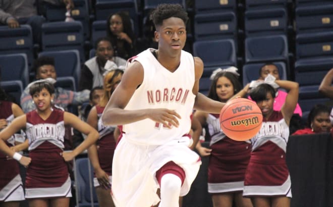 Norcom guard Travis Ingram has signed with the Towson Tigers from the CAA