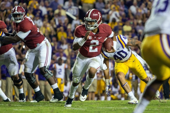 Alabama quarterback Jalen Hurts (2) carries the ball against LSU last season. Photo | Getty Images 