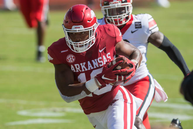 Burks scores a touchdown against Georgia last season.