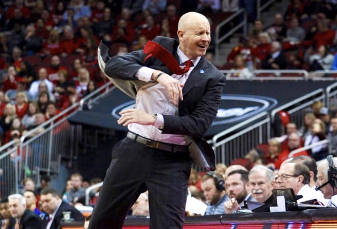 Louisville head coach Chris Mack has the Cardinals off to a 4-0 start. 