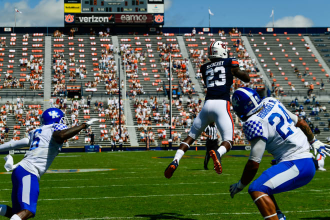 Roger McCreary intercepts a pass against Kentucky.