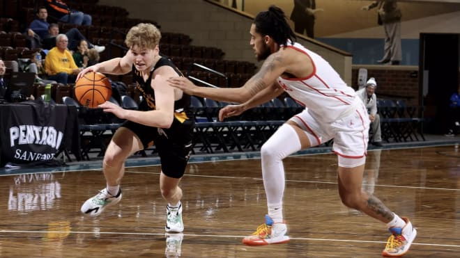 PJ Hayes moves off the dribble in a win over Minnesota State University Moorhead in the East/West Challenge at the Sanford Pentagon 