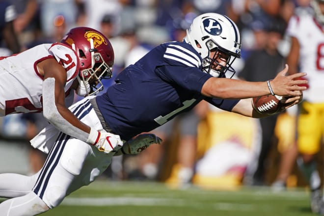 BYU quarterback Zach Wilson dives into the end zone for a go-ahead touchdown late in the fourth quarter.