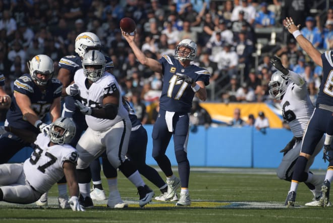 Former NC State quarterback Philip Rivers of the Los Angeles Chargers reached the 50,000-yard career milestone in a 30-10 win over the Oakland Raiders.