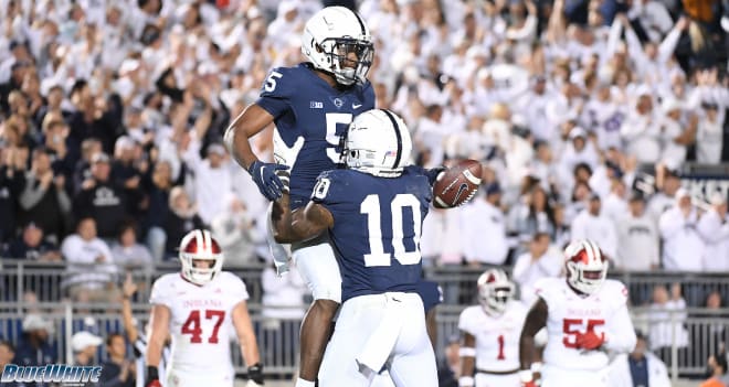 Penn State wide receiver Jahan Dotson (5) celebrates a third quarter touchdown pass with John Lovett (10) against Indiana during their NCAA college football game in State College, Pa., on Saturday, Oct. 2, 2021.