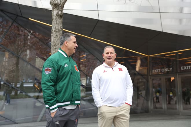 Head Coach Mario Cristobal (Miami) with Head Coach Greg Schiano (Rutgers)