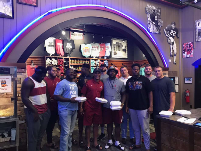 Jalen Hurts, middle, treated the rest of the Alabama offensive line to dinner Sunday night. Photo courtesy of Kendall Randolph's Twitter 