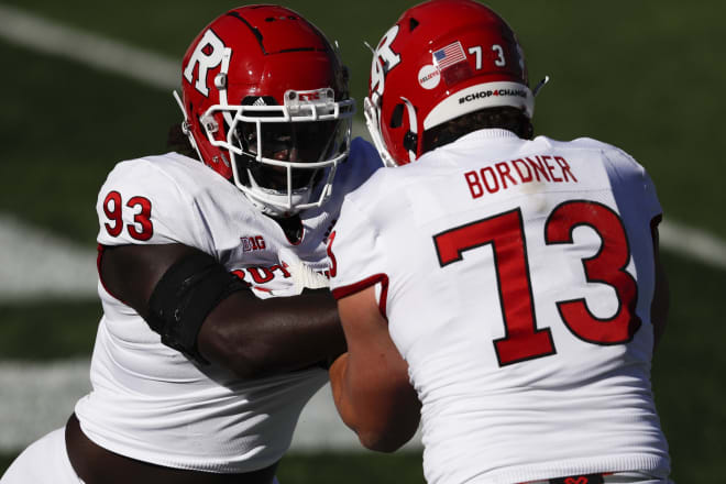 Oct 24, 2020; East Lansing, Michigan, USA; Rutgers Scarlet Knights defensive lineman Ireland Burke (93) warms up with offensive lineman Brendan Bordner (73) before the game against the Michigan State Spartans at Spartan Stadium