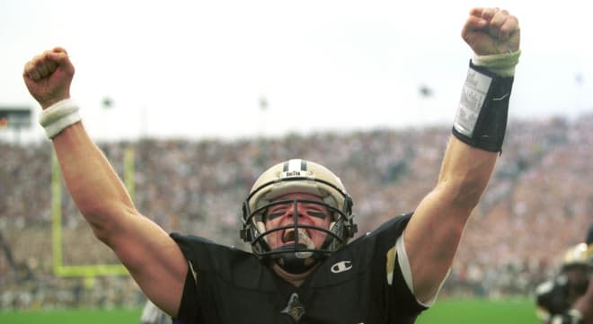 Drew Brees celebrates after scoring a rushing touchdown late in the third quarter against the No. 5-ranked Spartans.