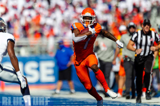 Boise State wide receiver, Octavius Evans (1) runs up the sideline during second half action against Nevada.