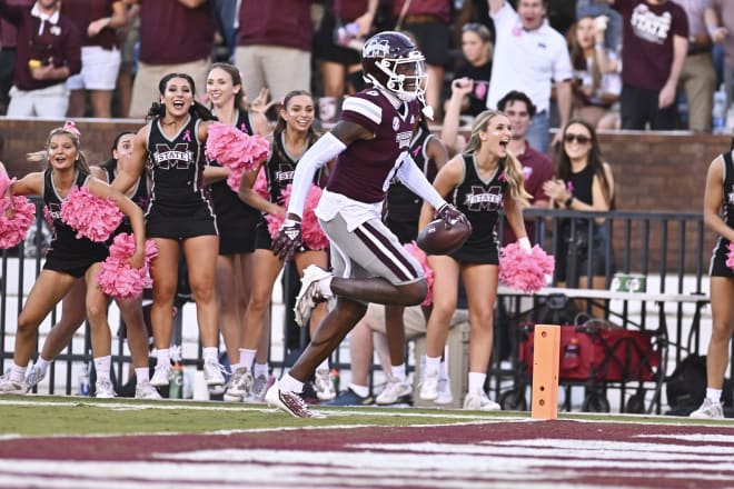 Oct 1, 2022; Starkville, Mississippi, USA; Mississippi State Bulldogs wide receiver Rara Thomas (0) scores a touchdown against the Texas A&M Aggies during the fourth quarter at Davis Wade Stadium at Scott Field.