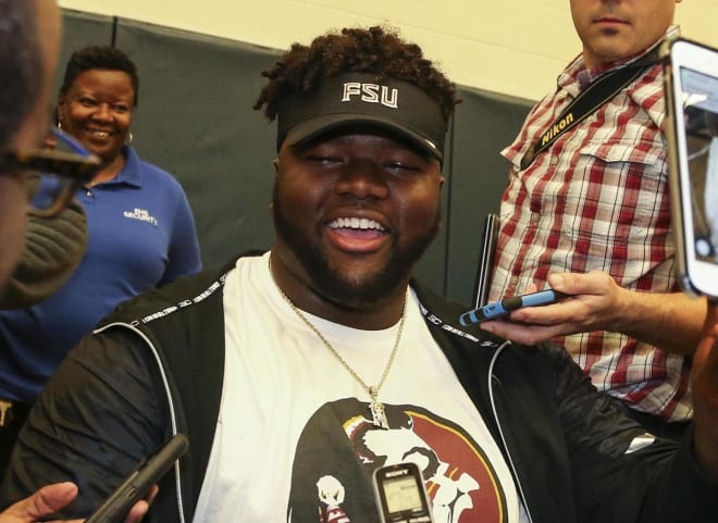 Marvin Wilson answers reporters' questions after committing to Florida State on Wednesday.