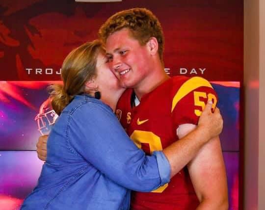 2020 DL/OL prospect Kyle Juergens (St. Margaret's School/San Juan Capistrano) celebrates his USC offer Wednesday with his mother Celeste Shoemaker-Marshall. (Photo courtesy of Kyle Juergens)