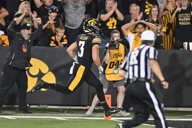 Iowa CB/PR Cooper DeJean returns a game-winning punt for a touchdown against Michigan State at Kinnick Stadium in 2023.