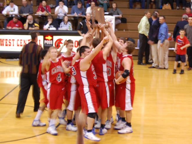 Caston Comets celebrating with 2009 Sectional trophy after going 1-19 regular season. (Photo Caston Basketball Alumni Assoc)
