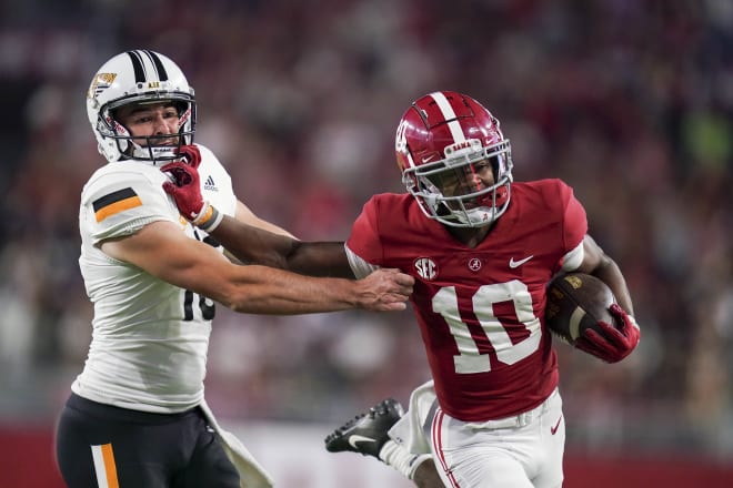 Alabama Crimson Tide wide receiver JoJo Earle (10) pushes away Southern Miss Golden Eagles punter Mason Hunt (16) at Bryant-Denny Stadium. Photo | Marvin Gentry-USA TODAY Sports