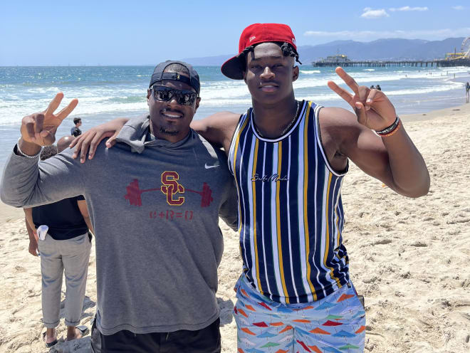 Rivals100 OLB Braylan Shelby, right, with USC OLBs coach Roy Manning at the beach in Santa Monica during Shelby's official visit this weekend.