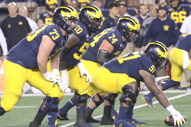 Michigan Wolverines football redshirt freshman right tackle Jalen Mayfield (No. 73 above) made his first career start on Saturday.