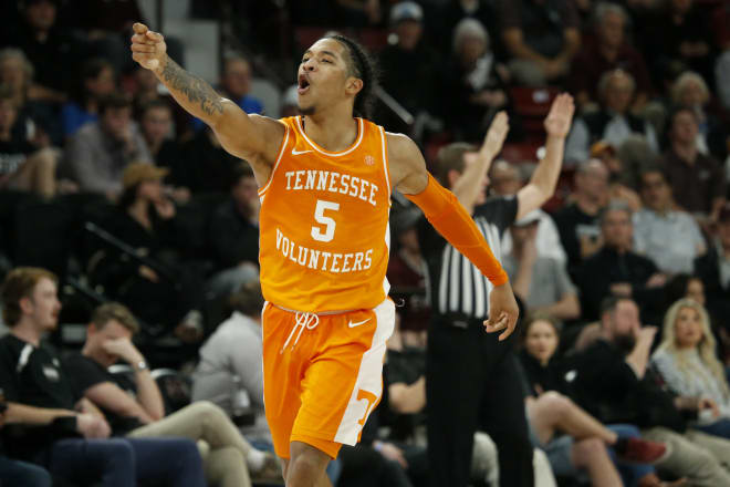Jan 17, 2023; Starkville, Mississippi, USA; Tennessee Volunteers guard Zakai Zeigler (5) reacts after a three-point basket during the second half against the Mississippi State Bulldogs at Humphrey Coliseum. 