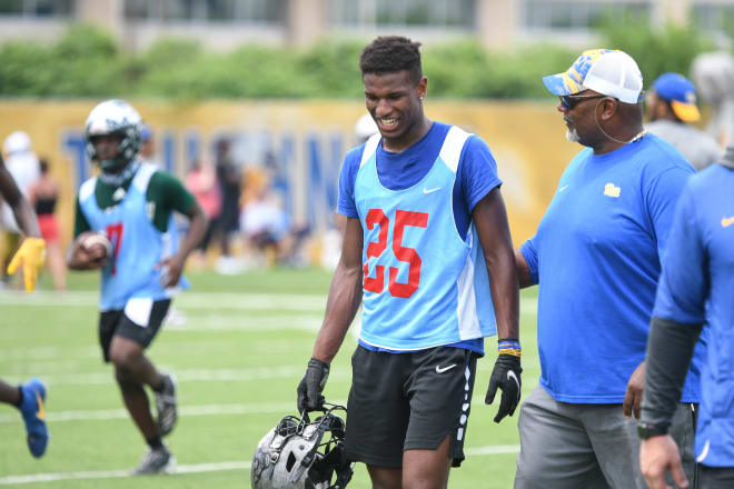 Belle Vernon's Quinton Martin with Pitt RB coach Andre Powell