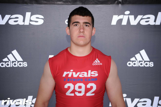 Three-star defensive lineman Michael Jarvis committed to Wisconsin without visiting Madison. 