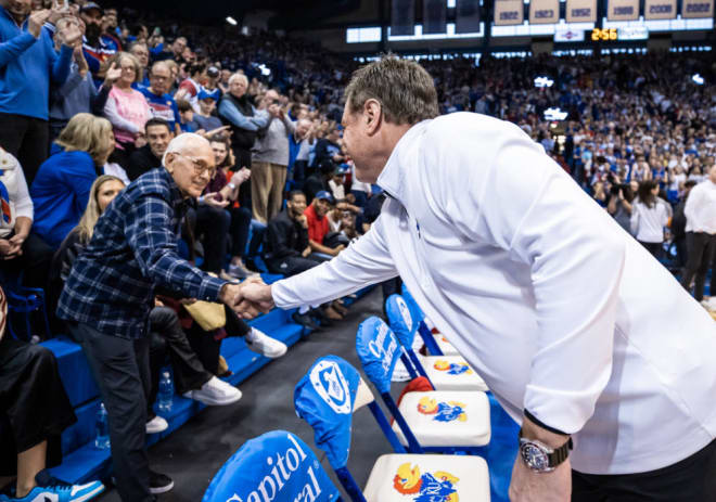 Bill Self shakes hands with Larry Brown, who was back for the reunion - KU Athletics photo