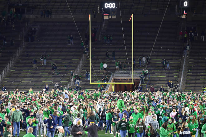 Irish fans celebrate on the field at Notre Dame Stadium on Nov. 7, 2000, after ND's takedown of No. 1 Clemson. 