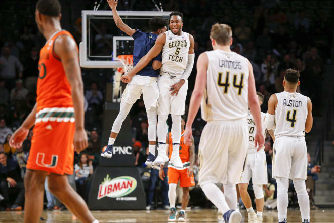 Josh Okogie celebrates with teammate Jon Brown during the win over #15 Miami last week