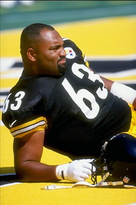 Center Dermontti Dawson of the Pittsburgh Steelers looks on from