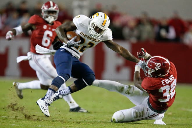 Alabama linebacker Rashaan Evans (32) tries to make a tackle on Chattanooga running back Kyle Nalls (22) during the Tide's 31-3 victory over UT Chattanooga in Bryant-Denny Stadium Saturday, November 19, 2016.