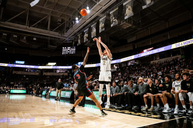 Wake Forest's Cameron Hildreth shoots a 3-pointer over Delaware State's Martaz Robinson on Monday night. 