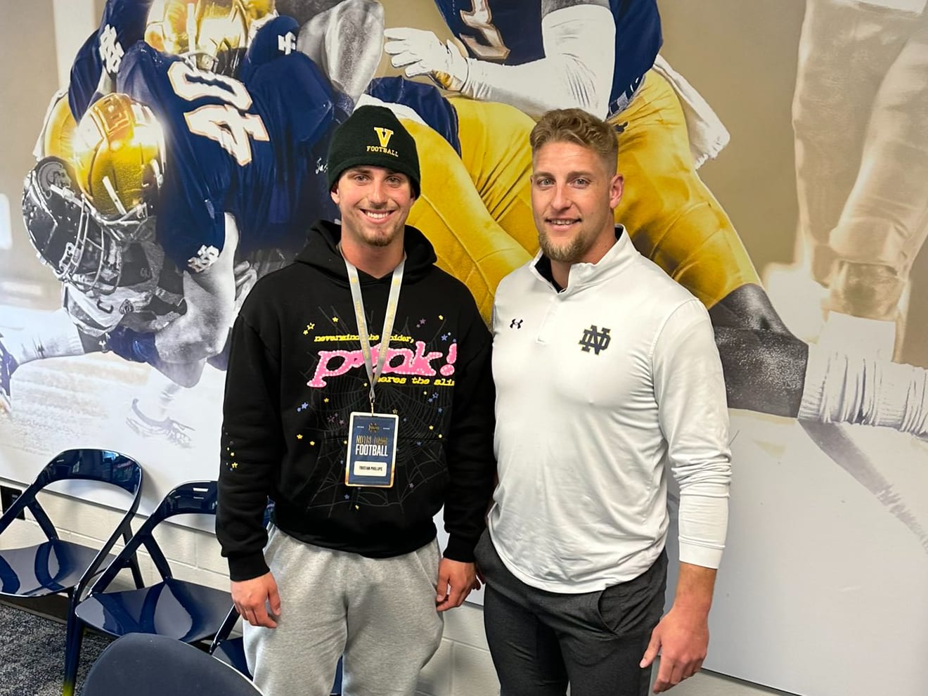 Tristan Phillips, left, with Notre Dame linebackers coach Max Bullough.