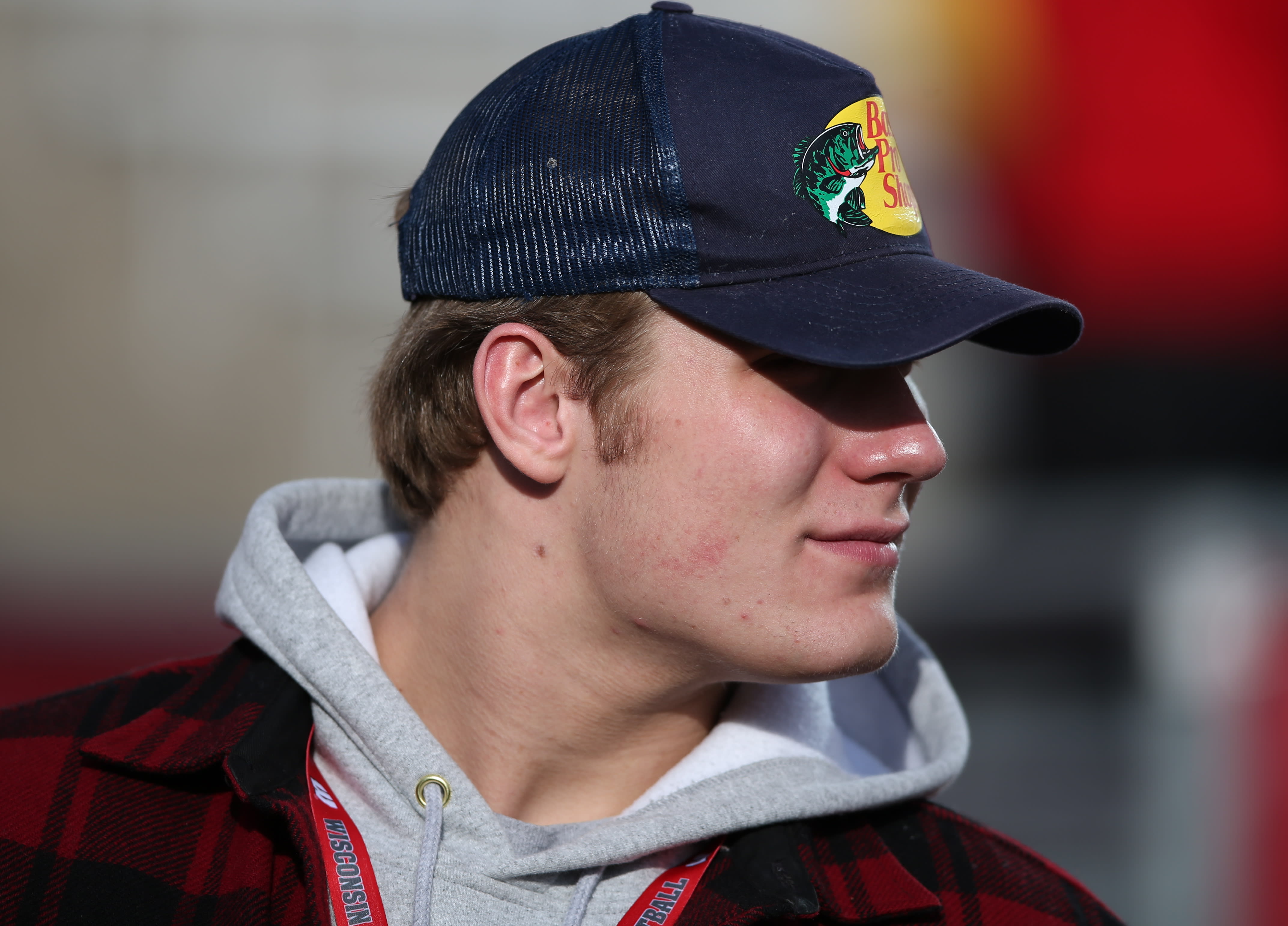 Guy Wearing Bass Pro Shop Hat