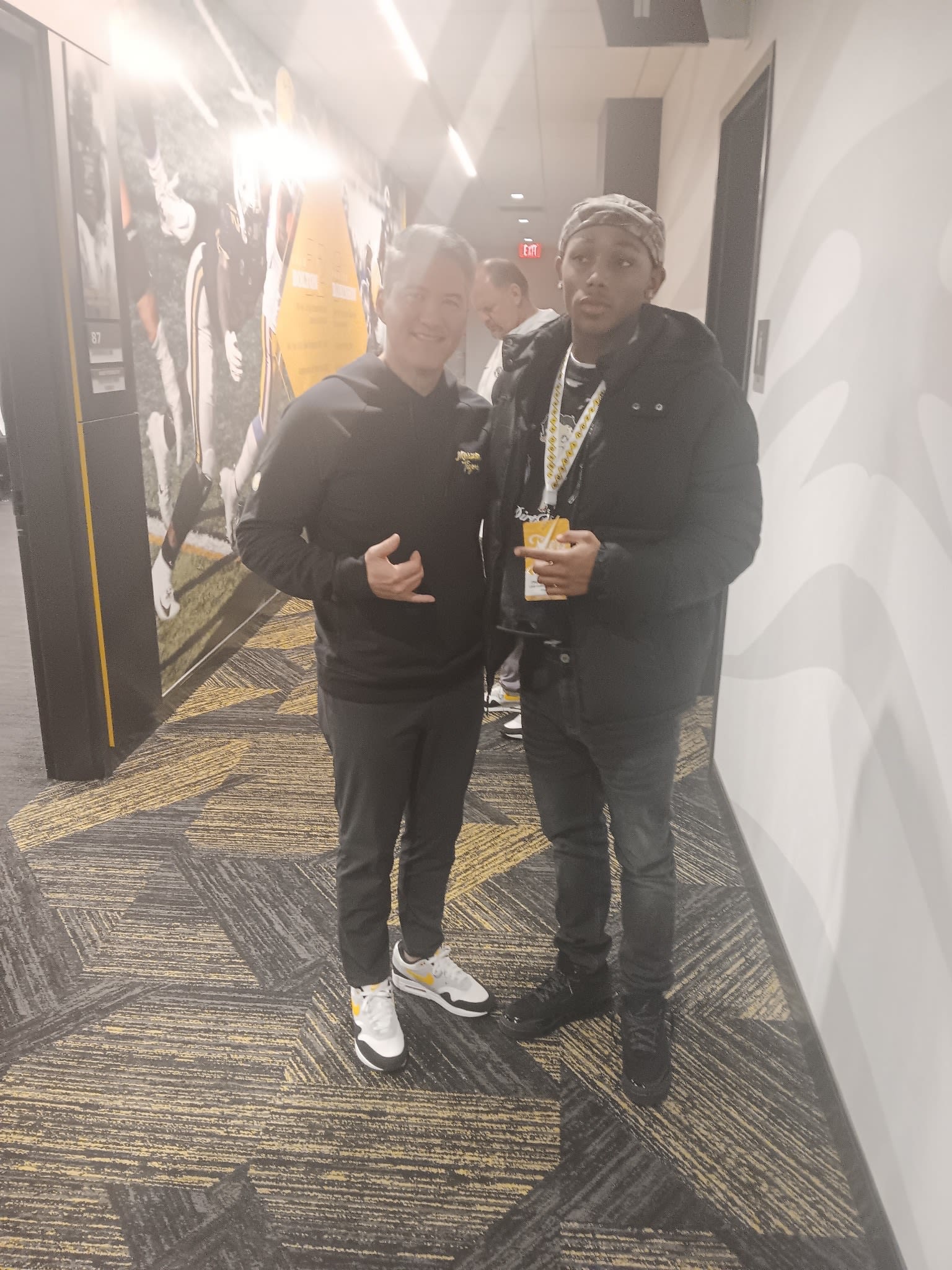 Corey Batoon (left) stands with Tylen Mathews (right) at Memorial Stadium in Columbia, Missouri.